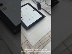 Instalasi lensa lampu taman surya dan pengeboran lengan.